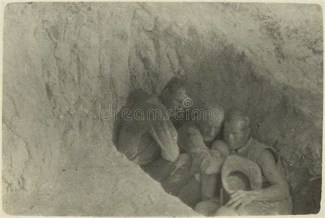 Sheltering From Bursting Shells Showing Three Anzac Soldiers Huddled