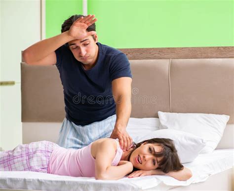 Man Doing Massage To His Wife In Bedroom Stock Image Image Of Masseur