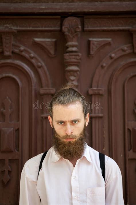 Hipster With Long Beard Looking At The Camera Stock Image Image Of