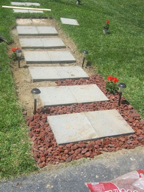 Explore elegant stone patio pavers, concrete driveway pavers, paver walkways, and hardscape paving stones. Paint Speckled Pawprints: A Walkway Reveal | Diy patio ...