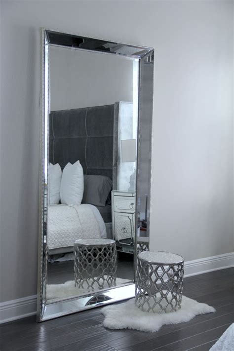 The duchamps storage mirror, set in a wood frame with a multistep, silver painted and distressed finish, rests on the floor and attaches to the wall for stability. 15 Best Contemporary Floor Standing Mirrors | Mirror Ideas
