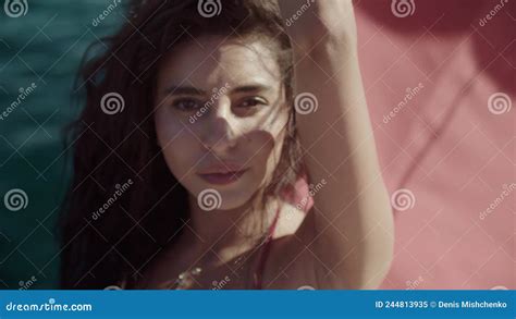 Portrait Of Young Woman Looking At Camera Standing On The Boat Stock
