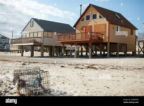 Beach houses line the coast in Plymouth, Massachusetts, USA in winter