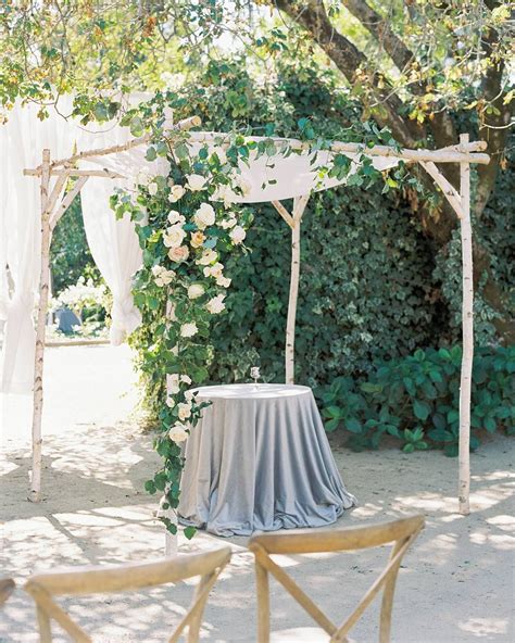 White Birch Chuppah With Organic Asymmetrical Floral And Greenery