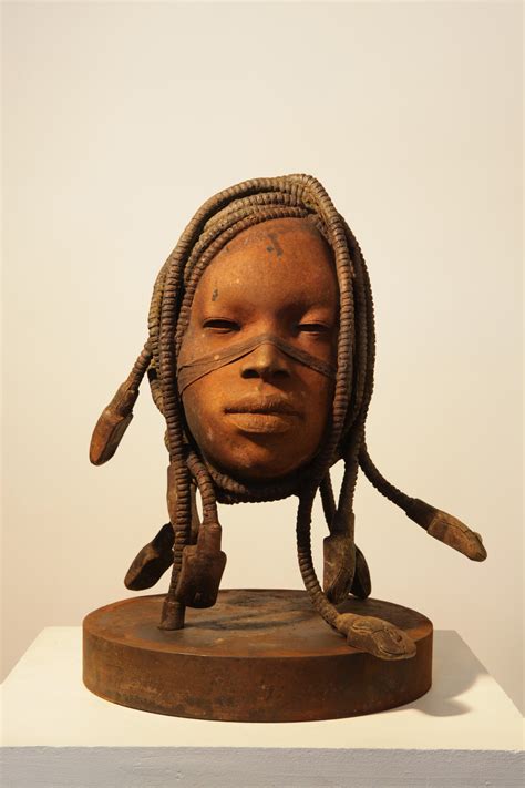 Head of African woman in bronze. Sale of sculptures online.