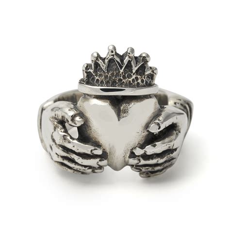 The claddagh ring is a traditional irish jewelry item composed of a pair of hands, which symbolize friendship; Claddagh Ring - The Great Frog