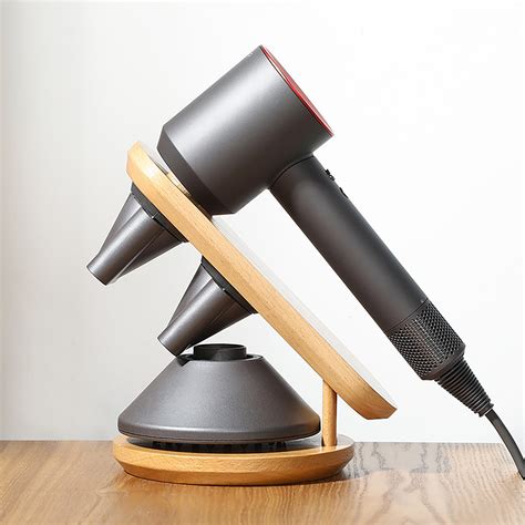 The dyson supersonic™ stand is engineered to neatly hold your hair dryer and its magnetic attachments, with one click. New BUMB Hair Dryer Holder Stand For Dyson Supersonic ...