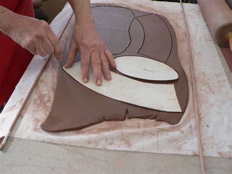 Butted slabs with 45 angles placed in jig. ANN TUBBS POTTERY STUDIO: Oval Forms; slab-built: part two