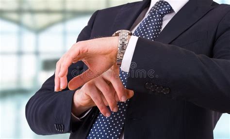 Business Man Checking Time On His Wristwatch Stock Photo Image Of