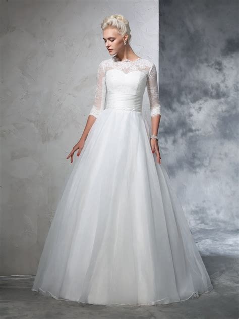 There is no disappointment when you are in the stylish 3/4 sleeve wedding dresses. Floor-Length Ball Gown Jewel 3/4 Sleeves Applique Organza ...