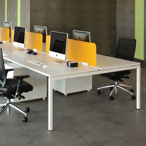The table top and both bench seats are crafted from manufactured wood for a sophisticated contrast. Nova Bench Desks | Modern Office Bench Desks | Apres Furniture
