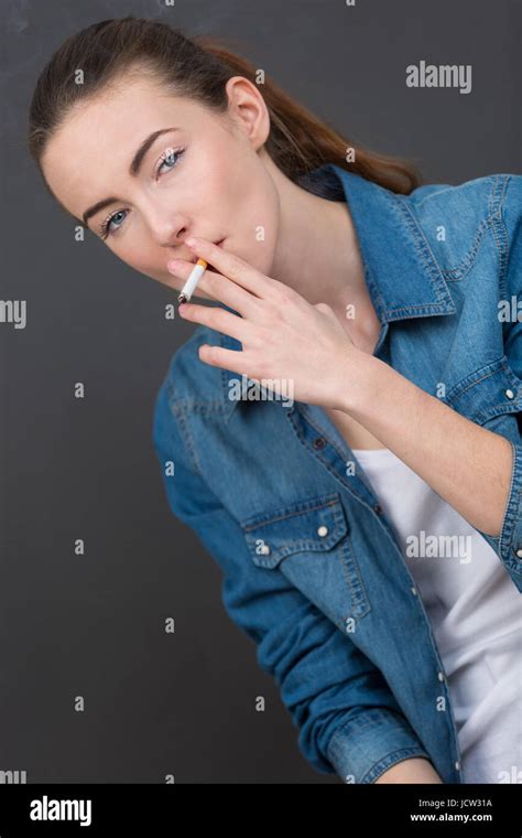 Pretty Woman Smoking Stock Photo Alamy