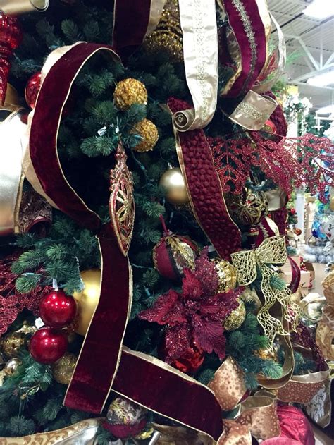 Our store fronts are conveniently located in mamaroneck ny and oradell nj. Burgundy and gold Christmas tree. Designed by Arcadia ...