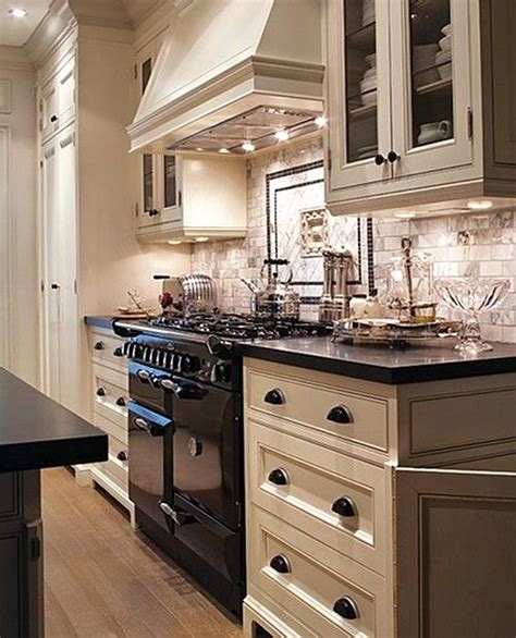 Cream colored kitchen cabinets with white appliances. cream colored kitchen cabinets with black stainless steel ...