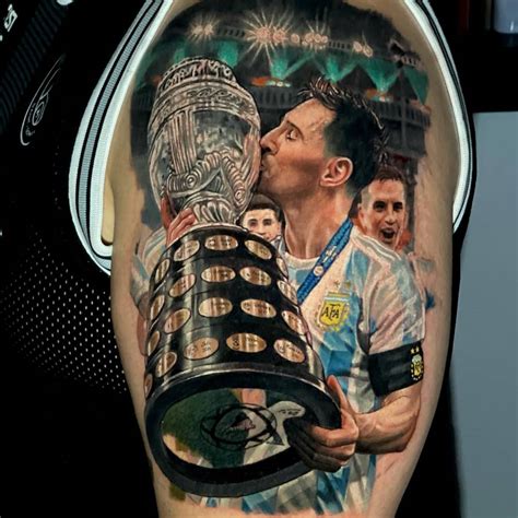 realistic messi tattoo located on the upper arm