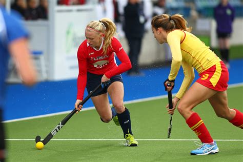 Hockey is a sport in which two teams play against each other by trying to manoeuvre a ball or a puck into the opponent's goal using a hockey stick. STX Signs USA Field Hockey Player Jill Witmer