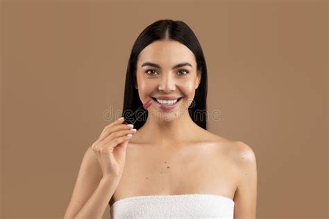 Beautiful Half Naked Woman Showing Her Lipstick Beige Background Stock