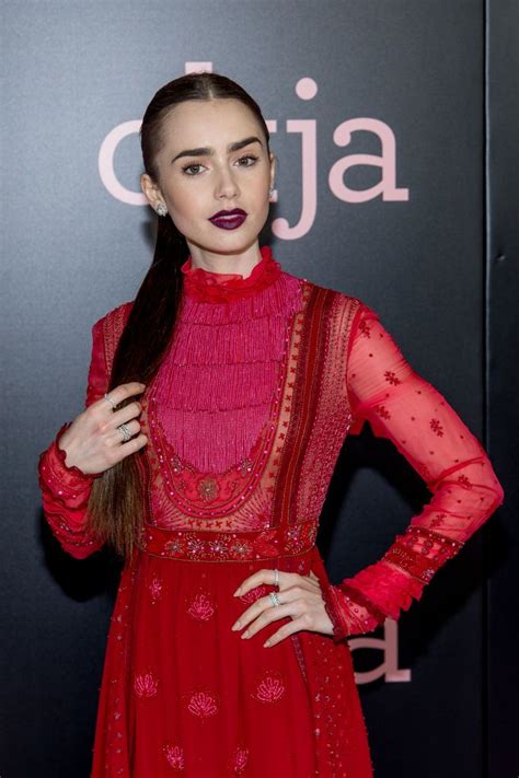 Lily Collins Holds Her Ponytail Lily Collins Style Lily Collins
