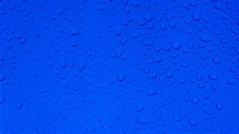 Download Wallpaper 1366x768 Drops Water Surface Macro Blue Tablet