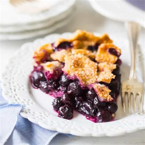 blueberry pie flaky crust and thick glaze y filling baking a moment