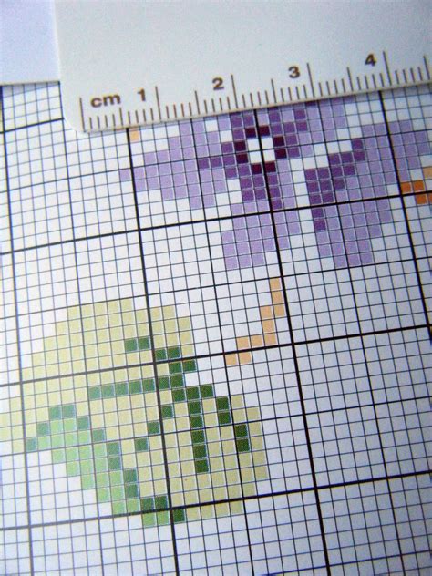 We need more creative people coming up with all sorts of neat designs! Quilliance: Quilling a cross stitch pattern
