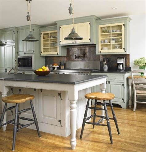 This white shaker kitchen feels open, airy, and maintains a sense of visual consistency throughout. . wythe blue cabinets and cream. like the blueish not sure ...