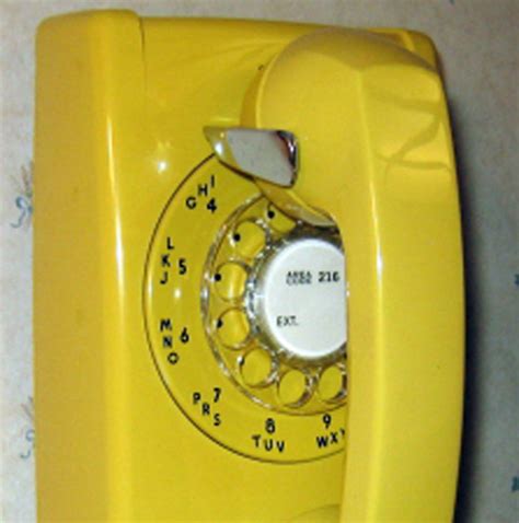 Old Yellow Wall Rotary Phone