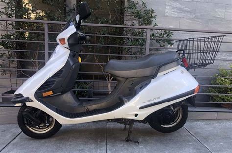 And Now For Something Completely Different Scooters Honda Elite Vs Vespa LX