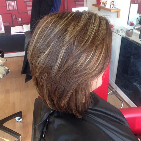 Beautiful short hair with a natural warm medium brown base with blonde
