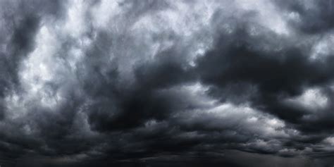 Dramatic Dark Stormy Sky With Rain Clouds As Background Stock Photo