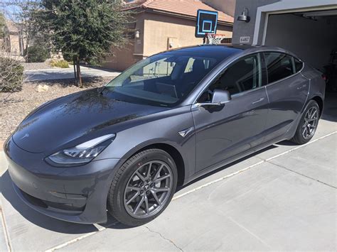 Midnight Gray Tesla Model 3 With Aero Covers Removed Tesla Model 3 Wiki