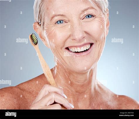 Mature Woman Portrait And Toothbrush For Dental Health Hygiene And Wellness And Oral Care