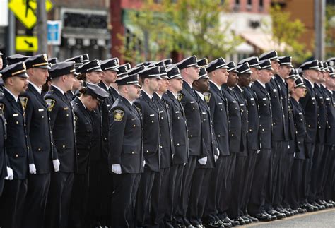 Public mourns fallen Syracuse police officer Michael Jensen during funeral