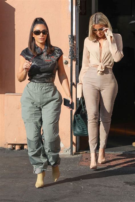 Khloe kardashian puts her curves and toned abs on display while showing off her new swimwear for good american on tuesday, may 18, 2021. KHLOE and KIM KARDASHIAN at Emilio's Trattoria in Encino ...