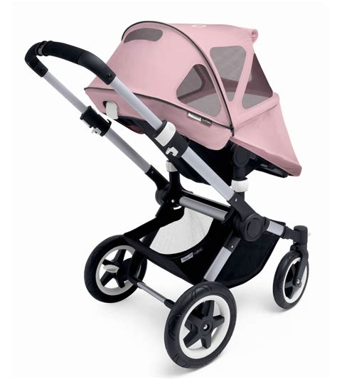 The windows at the side will allow your child to peek through at the world. Bugaboo Buffalo Breezy Sun Canopy - Soft Pink