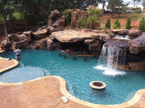 Backyard pools are often categorized into two extremes: Backyard Oasis Pools