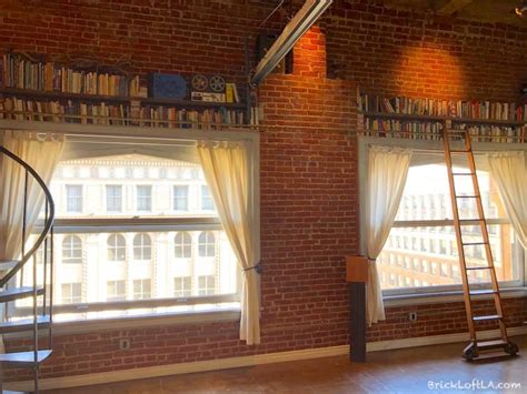 Exposed Brick Lofts In Industrial Apartment Located In Warehouse