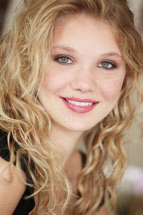 Portrait Of A Young Woman With Blond Hair And Green Eyes Troutdale