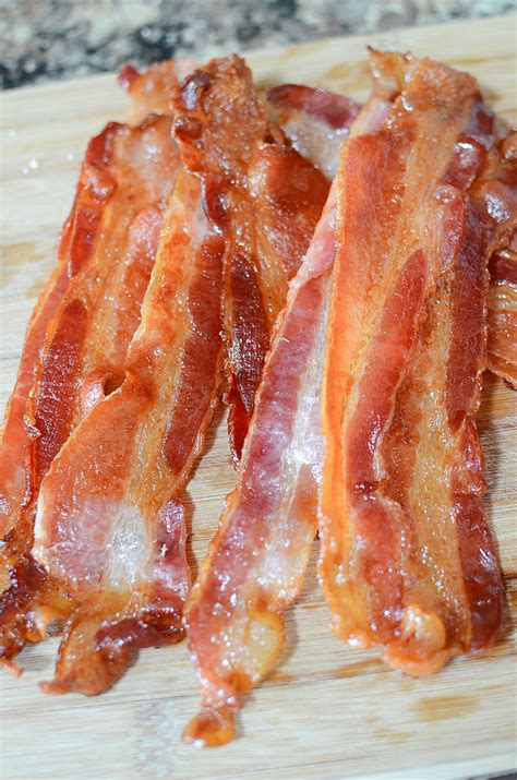 Bake until the bacon is crispy, about 20 minutes, depending on its thickness. How to cook Bacon PERFECTLY every time in the oven!