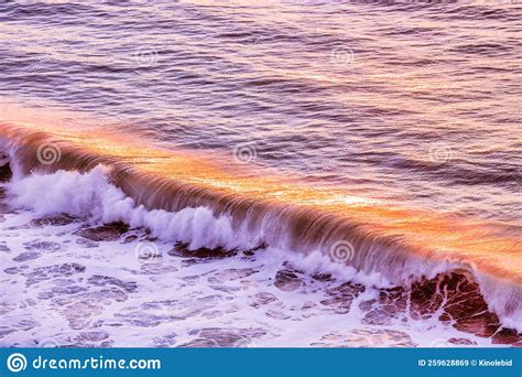 Sea Wave And Golden Sunset Reflection Pacific Ocean California Usa