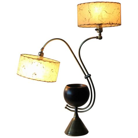 These items are essential for a localized source of light that is easy. Atomic Age Adjustable Mid-Century Modern Majestic Lamp 1950s For Sale at 1stdibs