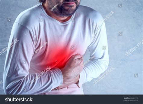 Severe Abdominal Pain Man Suffering From Stomach Ache Holding His