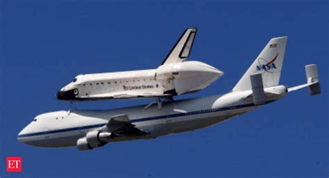 The Space Shuttle Endeavour Mounted Atop Nasas Modified Boeing 747