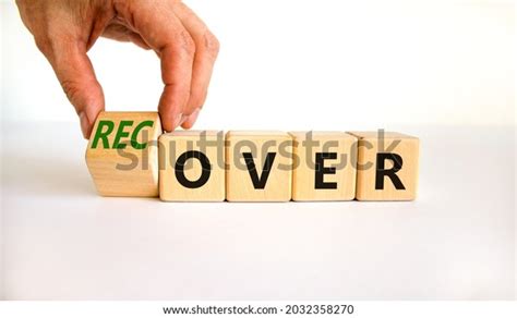 Time Recover Symbol Businessman Turns Wooden Stock Photo 2032358270