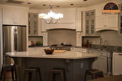 People gather to snack, chat and even entertain. Kitchen Island Design Tips