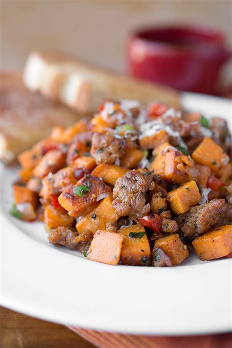 Autumn Sweet Potato Hash With Spicy Italian Sausage And Asiago Cheese