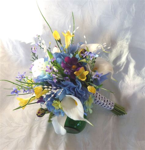 Blue delphinium and chamomile flowers call to mind wild fields of blooms and berries. Reserved Wedding bouquet white calla lilies blue yellow ...