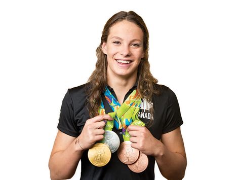 Penny oleksiak stands on the podium after she won gold in women's 100m freestyle final at olympic aquatics stadium during rio olympics on . Penny Oleksiak. (Photograph by Gabriel Rinaldi/Redux Pictures)