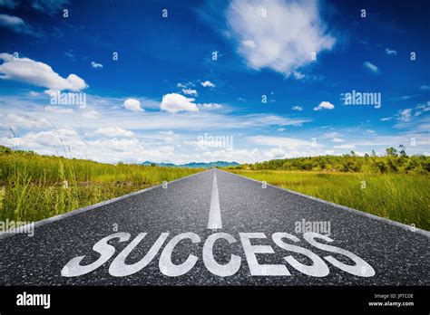 Road To Success Concept With 3d Rendered Success Text On Asphalt Road