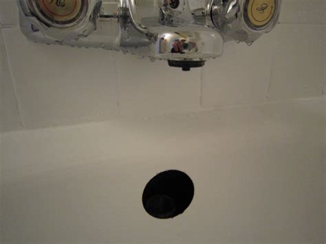 The Connection From Bathtub Overflow Pipe To Overflow Hole In Bathtub